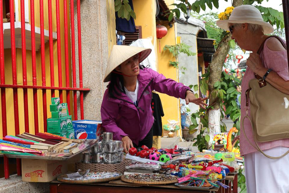 Hoi An - Sælger og turist